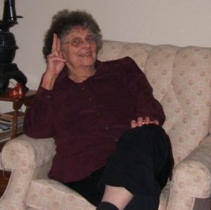 Grandma's throwing the peace sign.